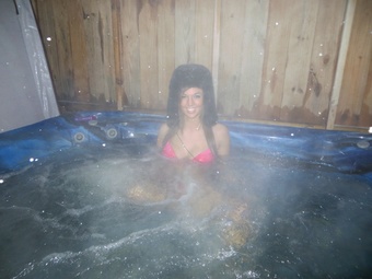 Val Midwest masturbating in the hot tub